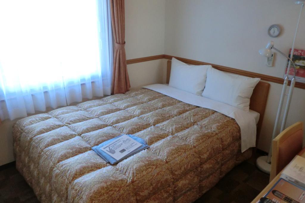 Toyoko Inn Hokkaido Sapporo-Eki Nishi-Guchi Hokudai Mae Buitenkant foto