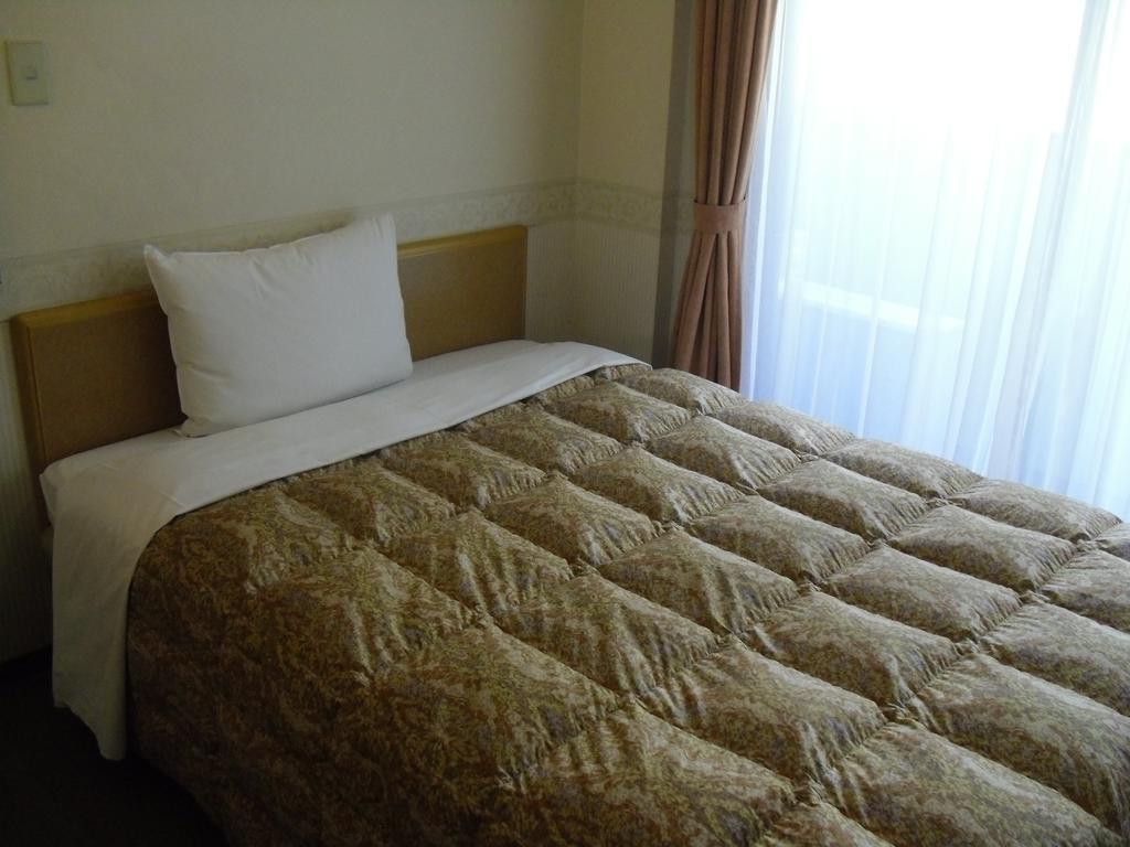 Toyoko Inn Hokkaido Sapporo-Eki Nishi-Guchi Hokudai Mae Buitenkant foto